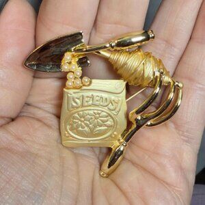 AJC Gardening Brooch Seeds Packet Shovel Tools Pin Gold Tone 2.25”